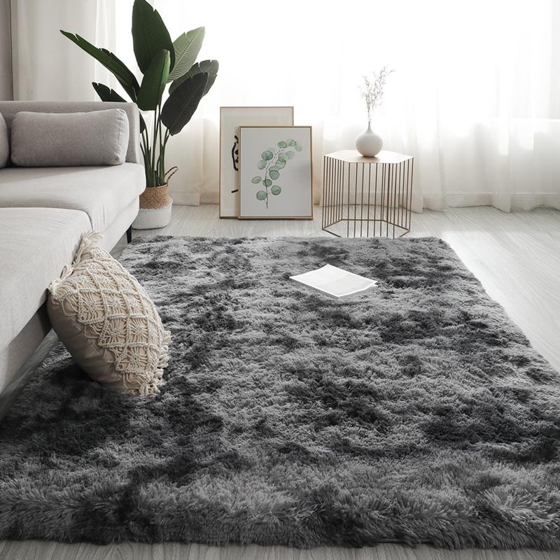 Tie-dye shaggy area rug in dark grey fade